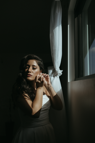 Vintage-Classy-Bride-Putting-On-Earrings-5159