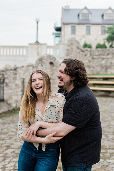Couple hugging and smiling while laughing