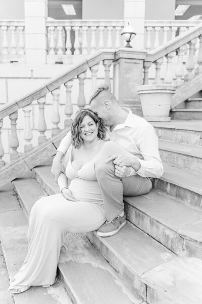 expecting couple laughing in Warrenton, Virginia taken by a maternity photographer in Northern VA