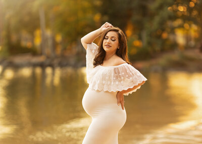 Dreamy sunset lake front maternity session at Jetton Park in Cornelius, NC