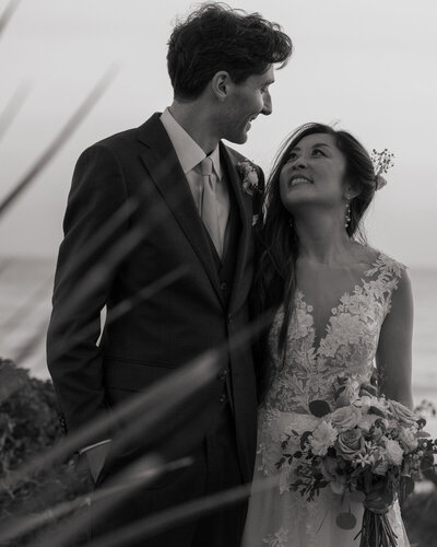 Pismo Beach wedding couples photos at sunset in black and white with wedding at Dolphin Bay Resort & Spa