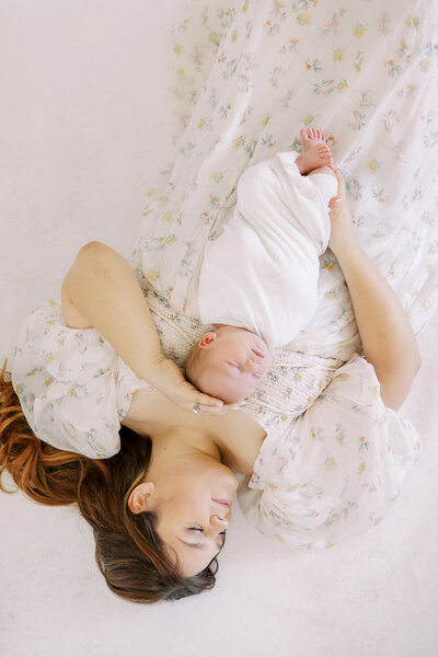 Light-filled Fresno newborn photo of baby in mother's arms