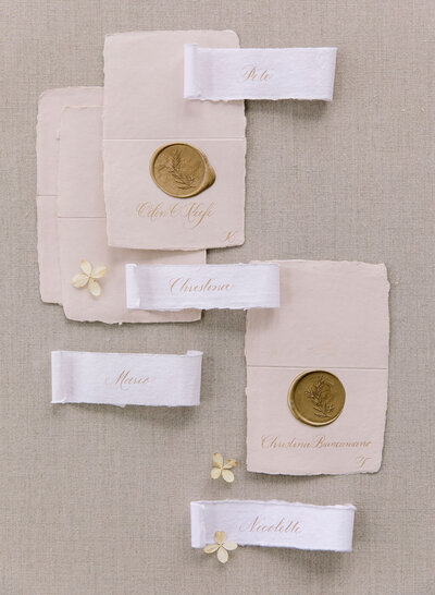 HANDWRITTEN CHAMPAGNE FLUTE HANG TAGS + ESCORT CARD TENTS WITH REAL WAX SEAL