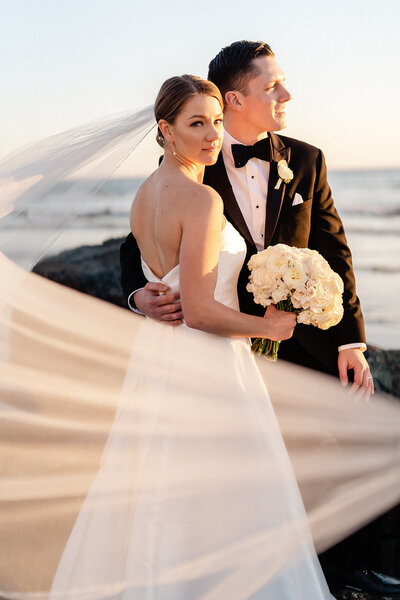 Bride and Groom sunset portrait at their wedding at the Hotel Del Coronado