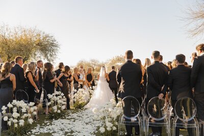 bride and groom saying vows at wedding in arizona