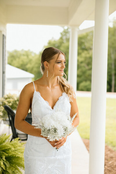 bride poses for bridal portraits in kansas city missouri