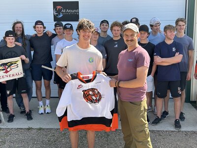 Group of young athletes mentored by All Around Performance, celebrating community impact