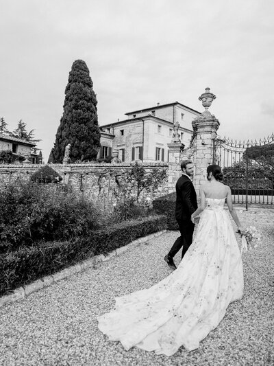 Bride in floral Monique Lhuillier wedding gown in Tuscany