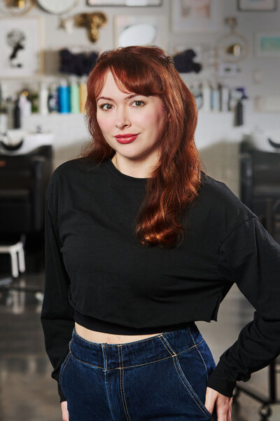 Headshot of Epoch Studio Salon's hair stylist, Carrie Ann Honey
