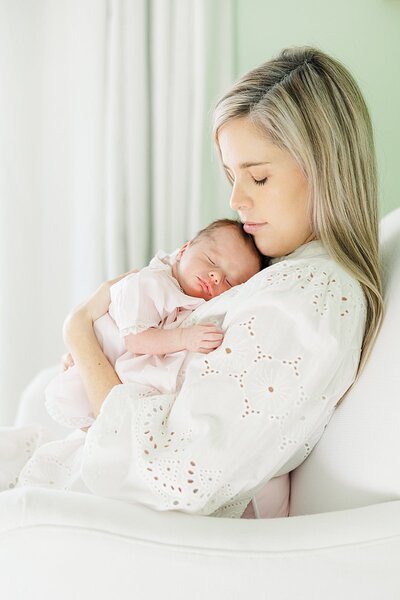mom holding newborn baby girl goldsboro nc