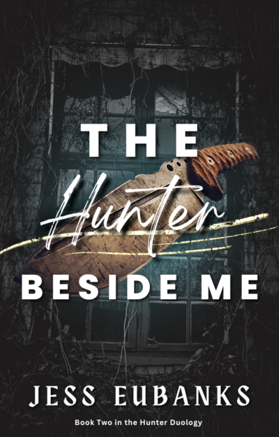 Cover design of The Hunter Beside Me features the knife stuck in a tree against a rundown home with the book title in a ethereal fantasy feel.
