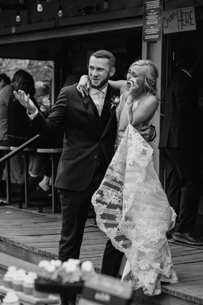candid of bride and groom during cocktail hour at denver colorado wedding