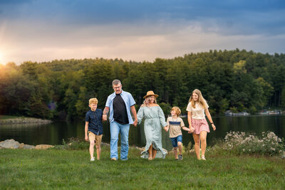 An Ohio family of four  takes Autumn family photos at Southside communiyt PArk located in New Philadelphia, Ohio.