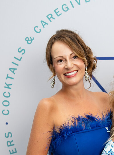 Headshot of Courtney Amos, Cocktails & Caregivers