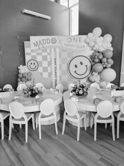 Black and white image of 1 happy Dude party signage and decor planned by Fancy Chancey in San Diego CA