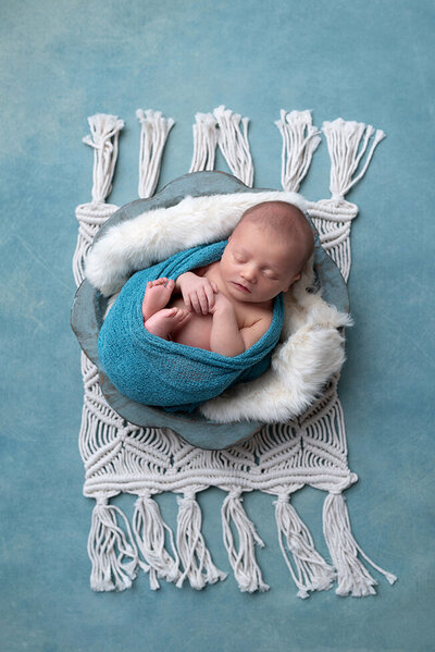 Newborn photo wrapped in Blue