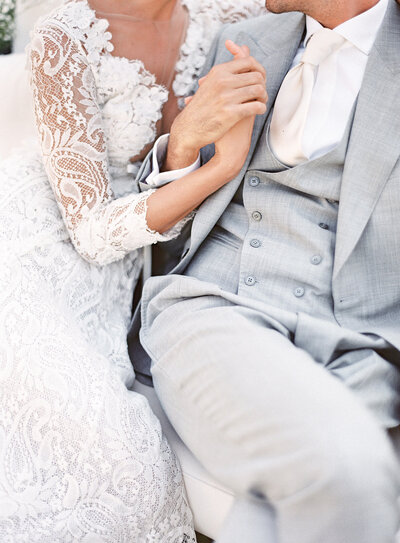 Destination wedding in Yosemite Valley inspiration shoot. Invitation suite with initials AD at the top of the white invitation. Underneath is a box of seeds the invitation is resting on. Also had a muted gold ribbon under the box, pearl earrings on a dish to the side, dried pods below, and dried flower stems by wooden name tags with the couples names burnt in to them. All on a white background. Photographed by wedding photographers in Charleston  Amy Mulder Photography