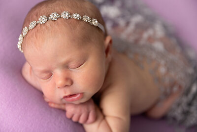 baby sleeping on purple blanket by Philadelphia Newborn Photographer