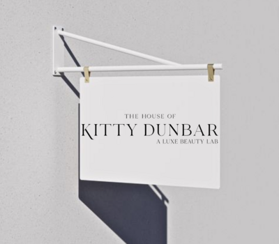 outdoor business sign for The House of Kitty Dunbar & Luxe Beauty Lab