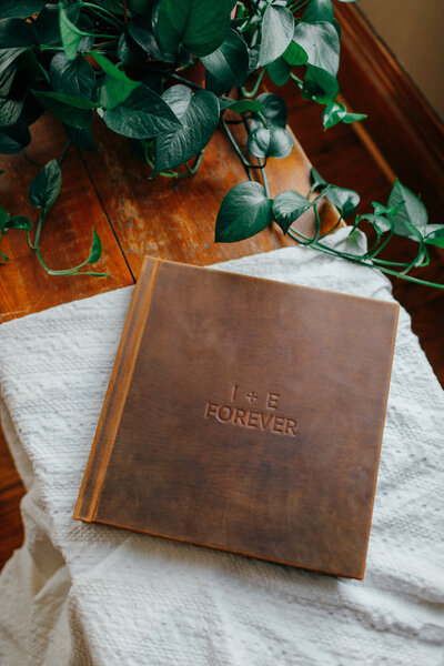a handcrafted leather wedding album with a lifetime guarantee