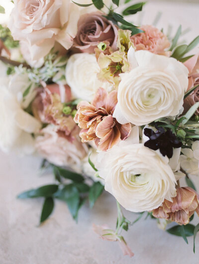 A fall bridal bouquet with white and mauve flowers