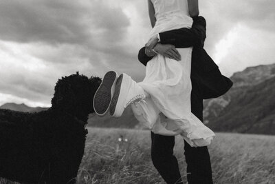 groom spins bride around in the air during their BC wedding