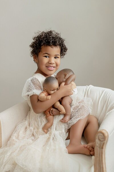 Joyful studio portrait by photographers in Traverse City MI