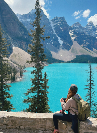 Lake Moraine Canada with girl looking out - tales of adventure