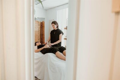 Practitioner Performing Acupuncture in Peaceful Setting