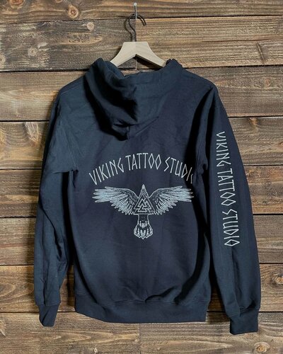 Back of Viking Tattoo Studio black sweatshirt with bird artwork.