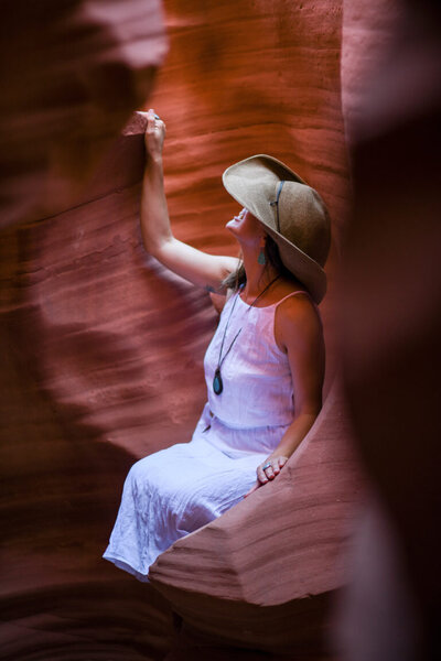 A breathtaking view of Antelope Canyon’s narrow slot, with sunlight illuminating the smooth sandstone and revealing the canyon's stunning beauty.