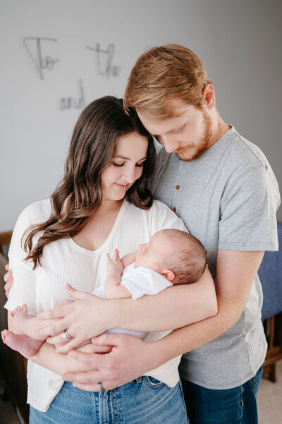 family with newborn in home lifestyle session in ooltewah tn