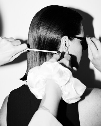 Hairstylist Hannah Hewitt performing an intuitive haircut in Vancouver studio.