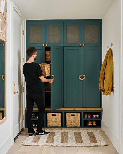 Mudroom with closed cabinet storage