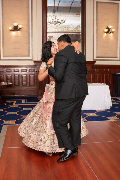 Bride and Groom dancing their first dance at the Driskill Hotel in Austin Texas