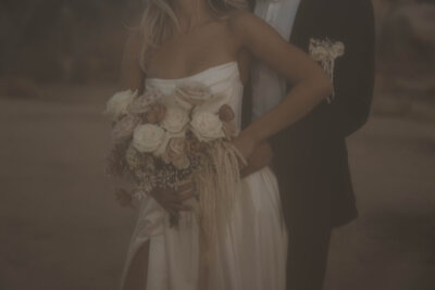 Step into a world of romance and artistry with Cassie Beth Photography, your premier wedding photographer in Iowa. Revel in the timeless elegance captured by Cassie's lens, each moment an artistic masterpiece. Seamlessly navigate wedding photographer costs and experience the perfect blend of photography and videography.