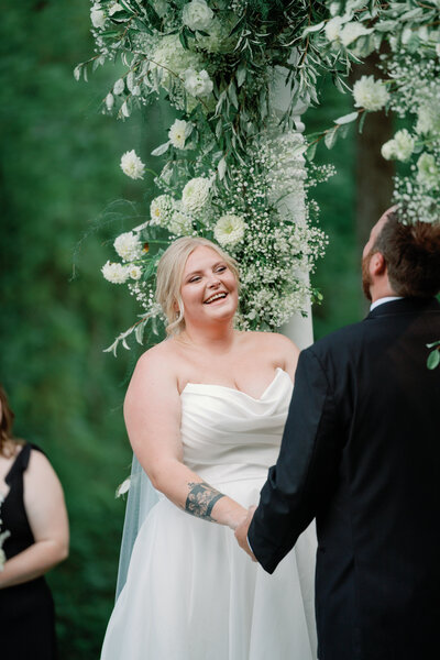 couple laughing during ceremony
