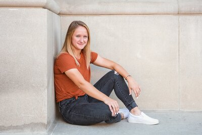 senior sitting in downtown nebraska