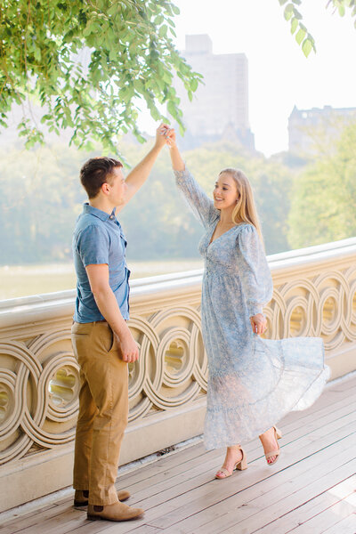 Couple dancing together for engagement photo session