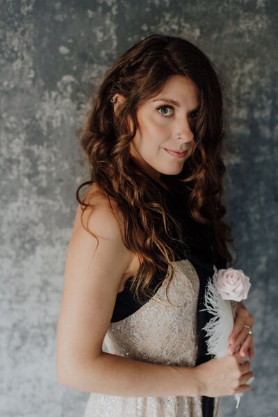 Luna Skye holding flower