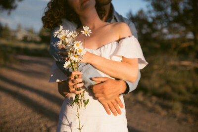 Bride and Groom embracing each other during their wedding portraits.