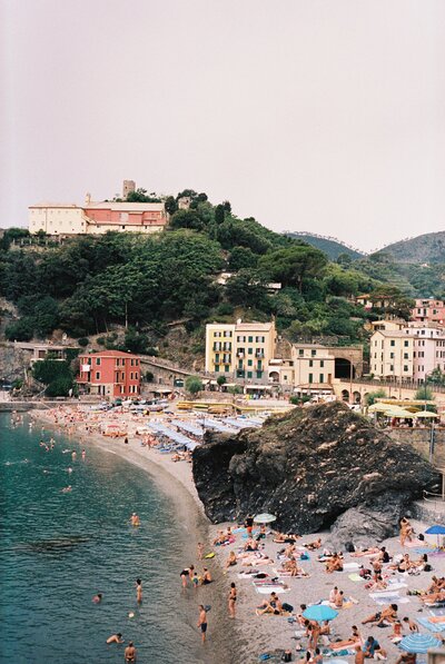 guests enjoying a wedding weekend swim along the Italian coastline 