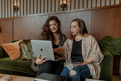 women looking at computer
