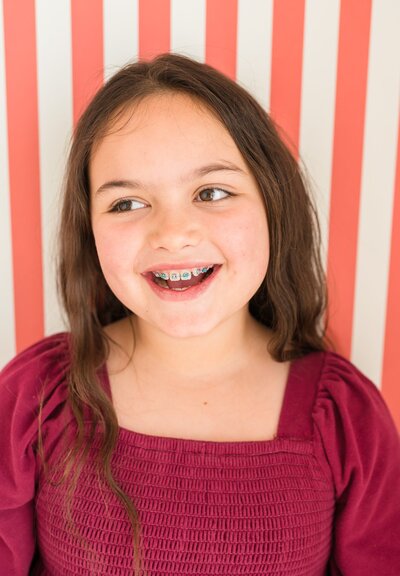 Child and teen with braces in our Nashville orthodontic office