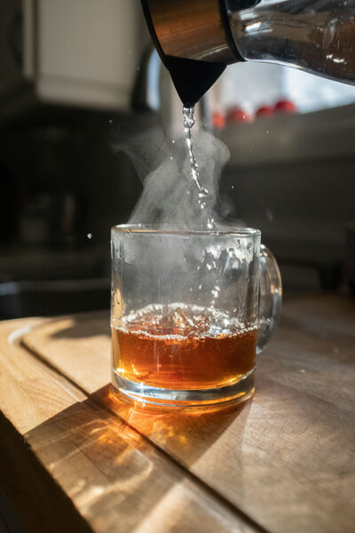 pouring hot tea