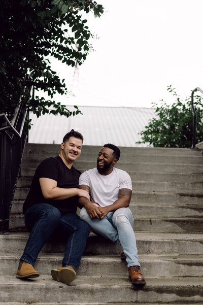 Micah and Dough sharing a joyful moment during their Richmond engagement session.