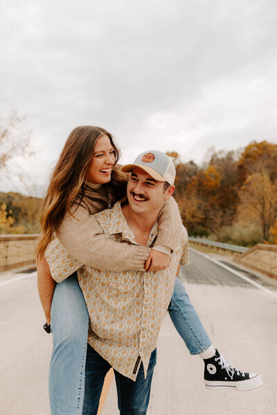 couple grinning for photo