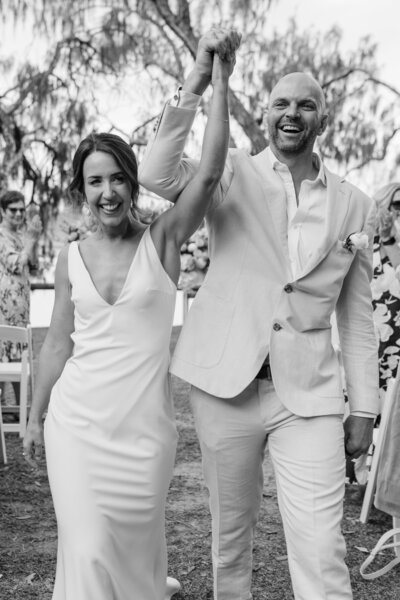 Bride and groom walk up memorial steps at their DC wedding