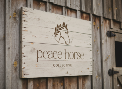 Peace Horse Collective logo on a wooden barn sign for an equine-assisted therapy brand.
