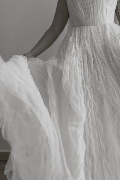 Close-up of flowing textured tulle skirt.